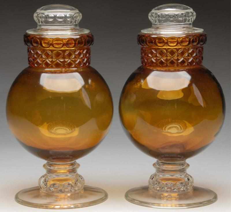 Appraisal: Lot of Amber Glass Dakota Apothecary Jars Description Circa early