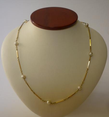 Appraisal: A CULTURED PEARL AND GOLD NECKLACE having pearl beads with