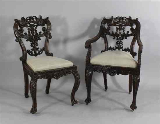 Appraisal: A set of six Anglo-Indian carved hardwood dining chairs four