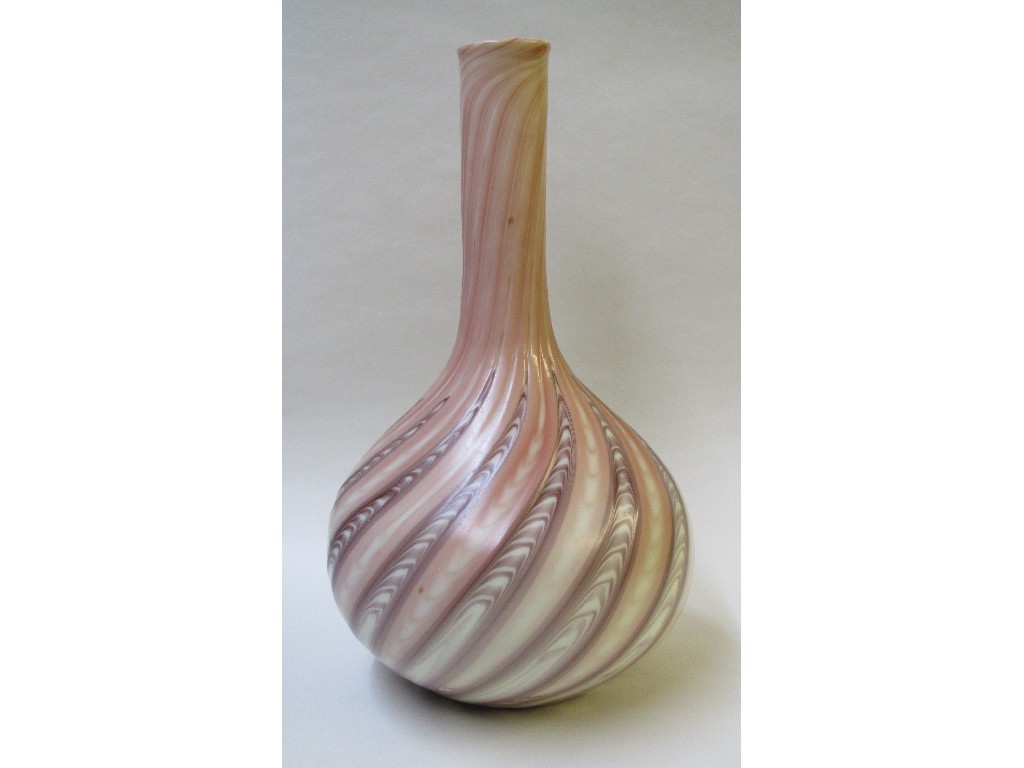 Appraisal: A pink overlaid glass vase with pulled spiral decoration and