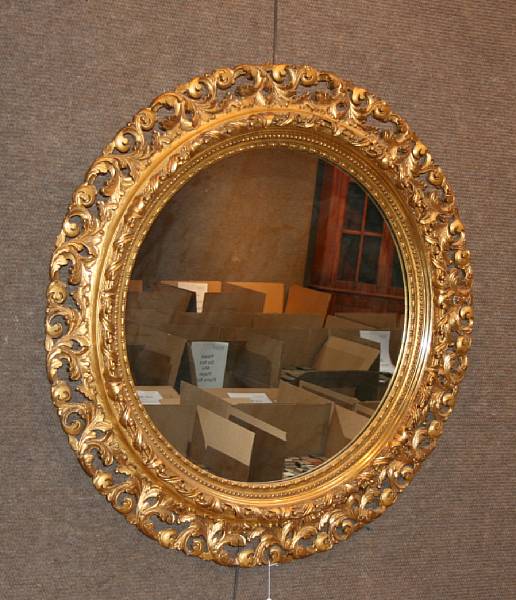 Appraisal: A Neoclassical style gilt mirror early th century diameter in