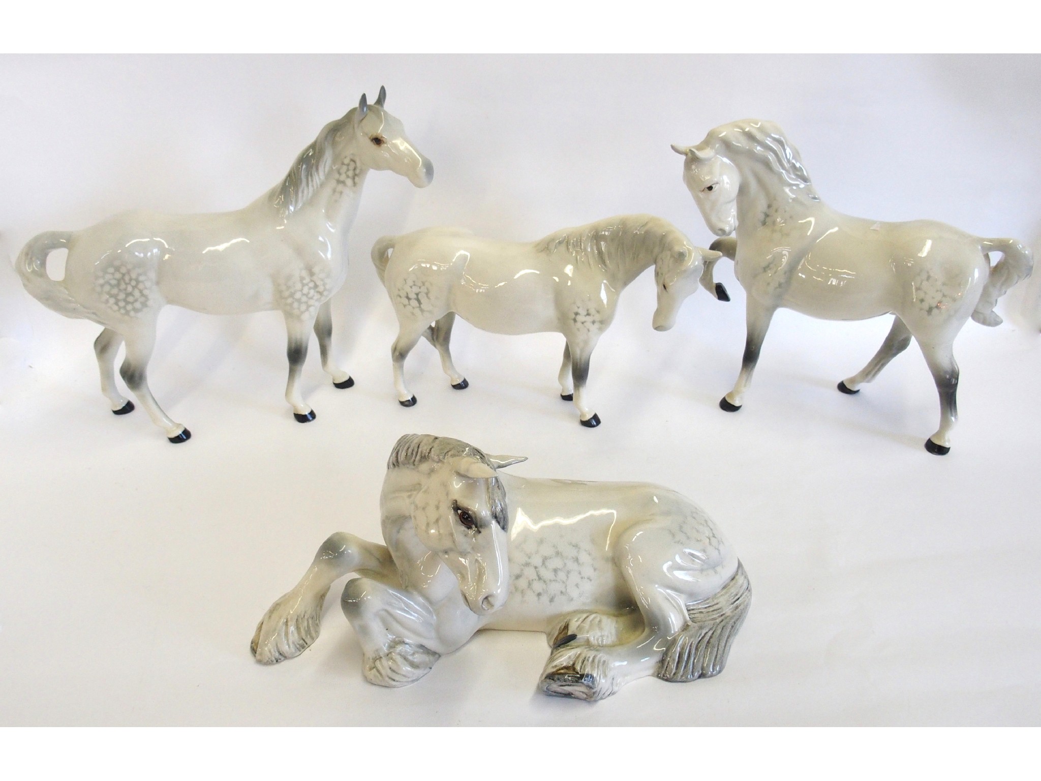 Appraisal: Four Beswick figures of horses