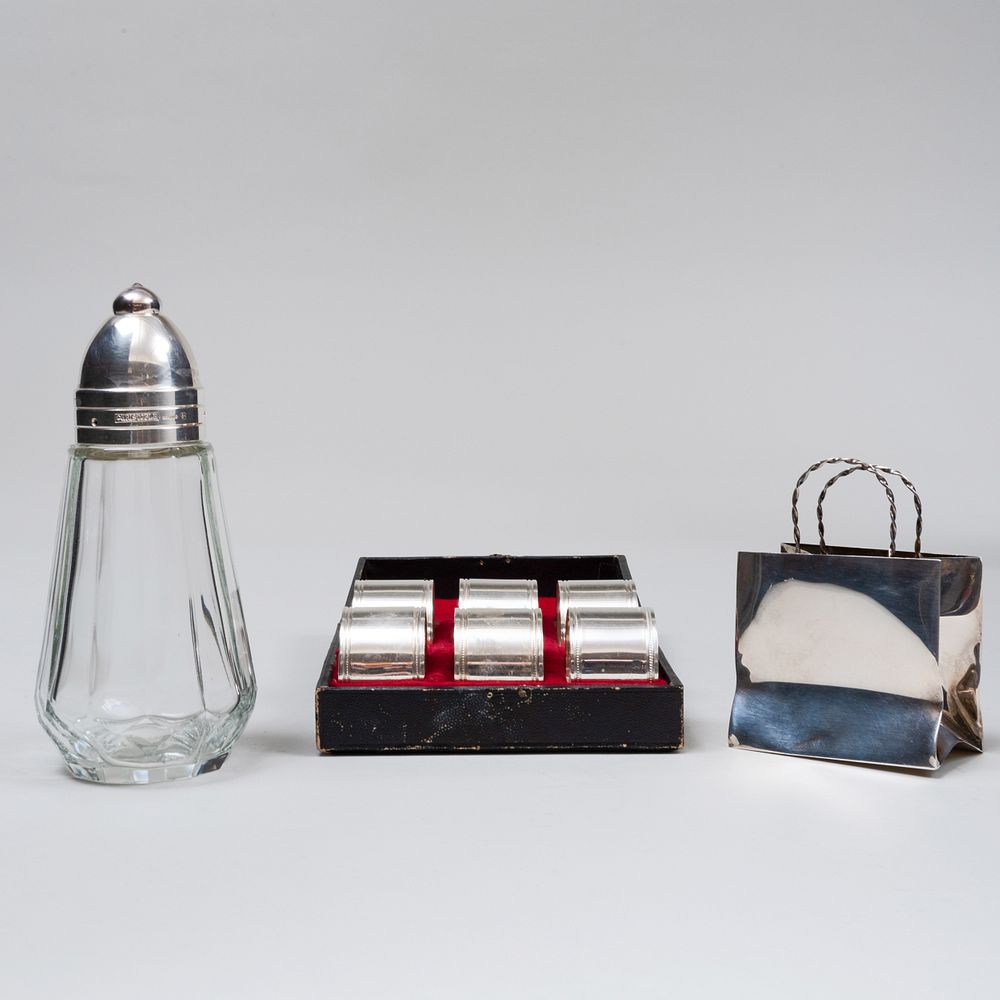 Appraisal: Cartier Silver Miniature Shopping Bag and a Christofle Silver Plate