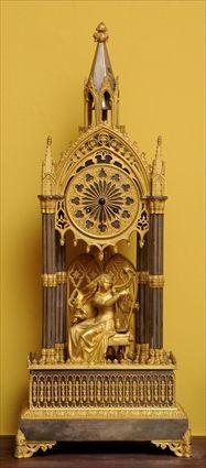 Appraisal: LOUIS-PHILIPPE BRASS AND GILT-BRONZE CATHEDRAL MANTEL CLOCK The dial with