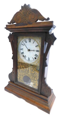 Appraisal: A late thC American mantel clock in a carved and