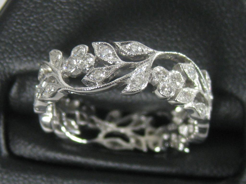 Appraisal: A contemporary Diamond Eternity Ring the openwork floral and leafage