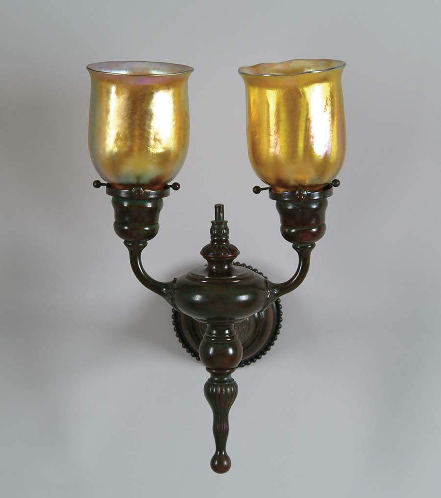 Appraisal: TIFFANY TWO LITE SCONCE Beautiful Tiffany sconce has artichoke design