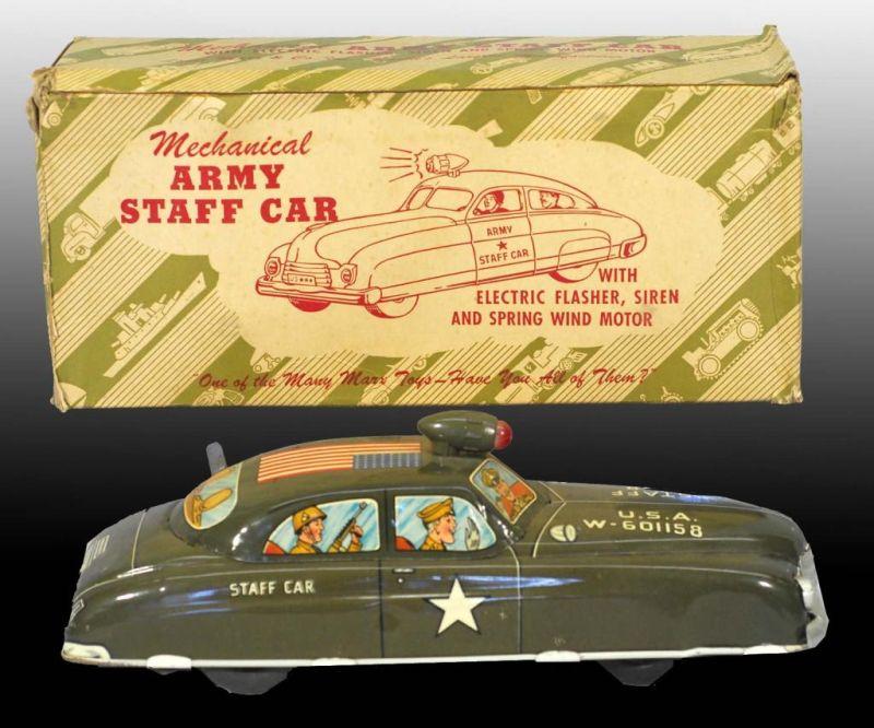 Appraisal: Tin Marx Army Staff Car Wind-Up Toy Description American Working