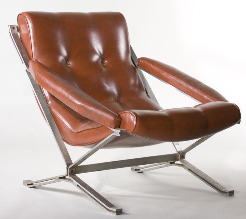 Appraisal: Italian Mid-Century Low Lounge Chair rust colored leather and steel