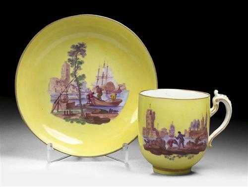 Appraisal: CUP AND SAUCER Tournai mid th century Polychrome merchant scenes