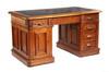 Appraisal: DESK - Circa walnut Victorian flat top desk with carved