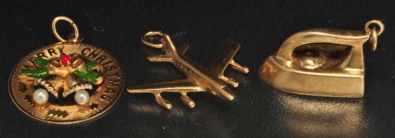 Appraisal: Lot of K Y Gold Charms Description Includes one iron