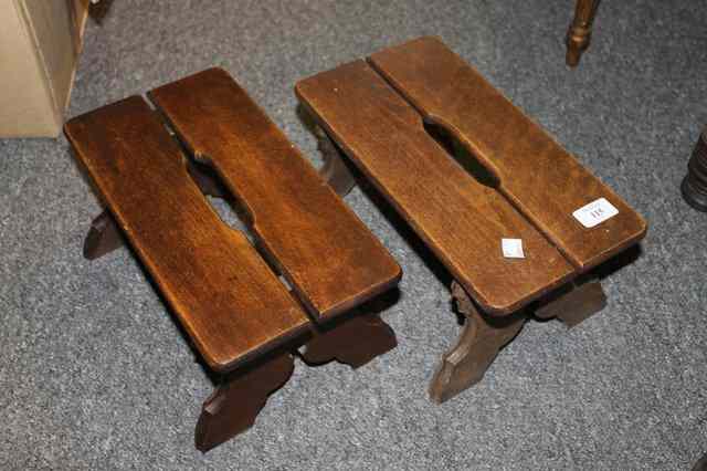 Appraisal: A PAIR OF BEECHWOOD FOOT STOOLS of simple form with