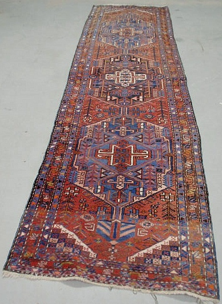 Appraisal: Colorful Persian oriental hall runner with geometric patterns x