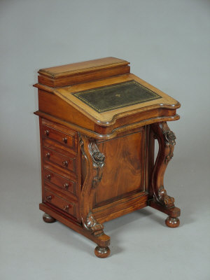 Appraisal: A Victorian style mahogany Davenport the top with hinged inkwell