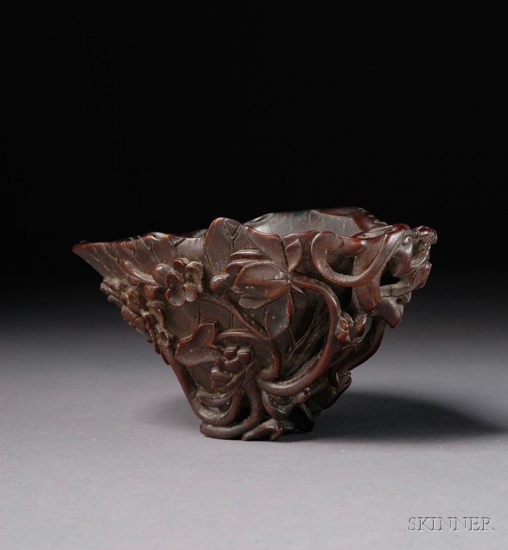 Appraisal: Rhinoceros Horn Libation Cup China th century dark amber color