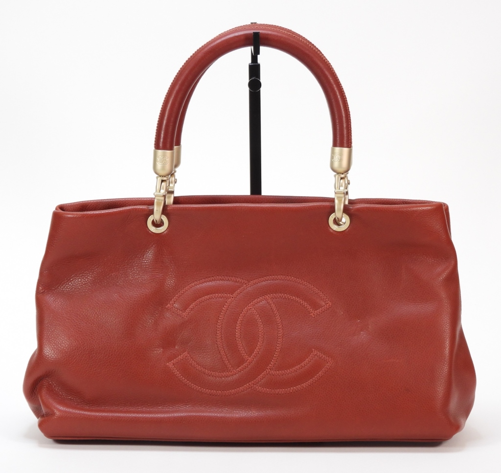 Appraisal: CHANEL DEEP RED LEATHER CC HANDBAG Double handled red leather