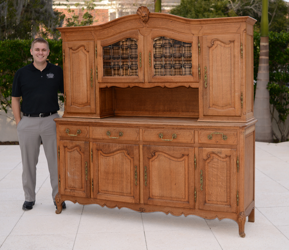 Appraisal: COUNTRY FRENCH SIDEBOARD CURIO Shaped pediment with applied shell carved