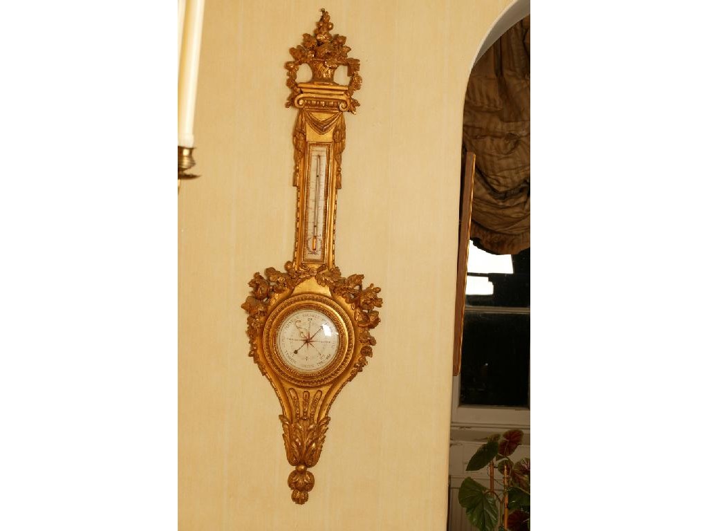 Appraisal: A LOUIS XVI GILTWOOD BAROMETER inscribed Passement a Versailles and