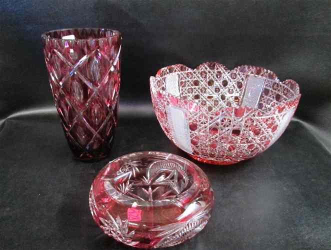 Appraisal: THREE CUT AND COLORED CRYSTAL TABLEWARE each red cut to