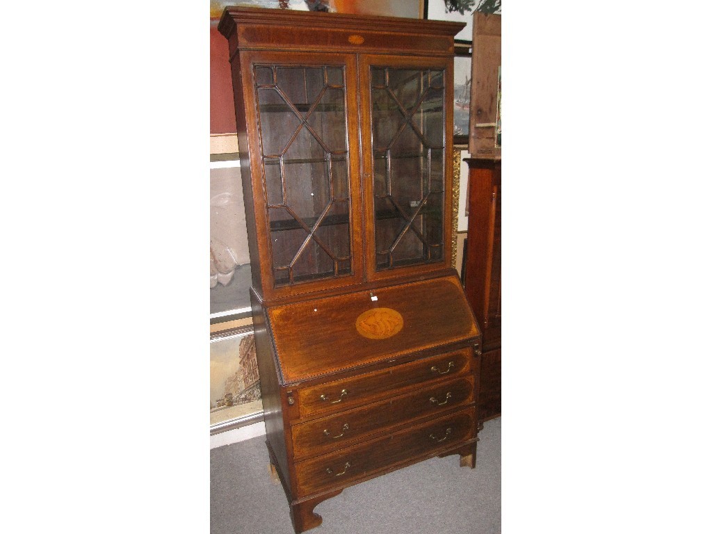 Appraisal: Edwardian mahogany and inlaid bureau bookcase