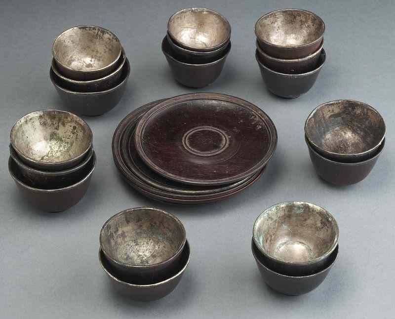 Appraisal: Chinese Qing zitan libation cups each with a silver liner