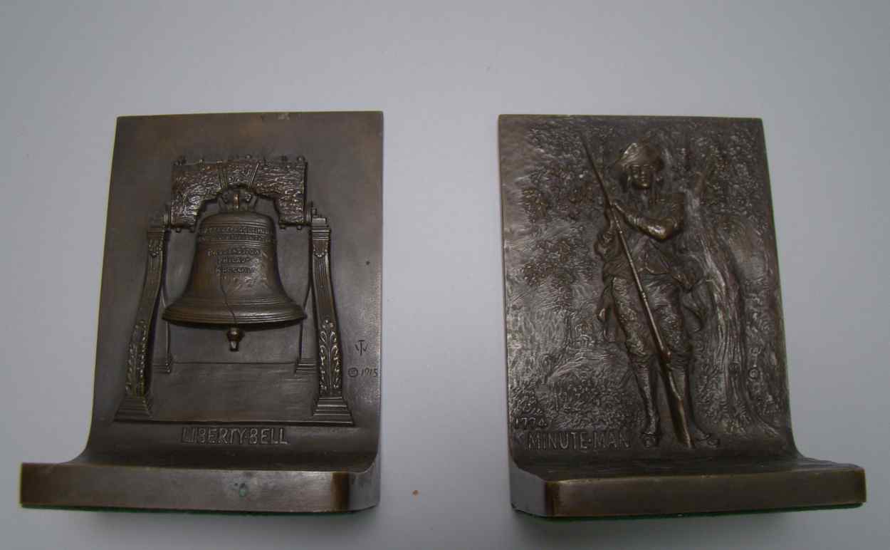 Appraisal: PAIR OF CAST BRONZE COLONIAL REVIVAL BOOKENDS Early th CenturyOne