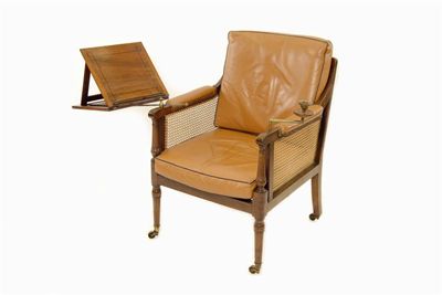 Appraisal: A th century bergere armchair re-caned and with replaced leather