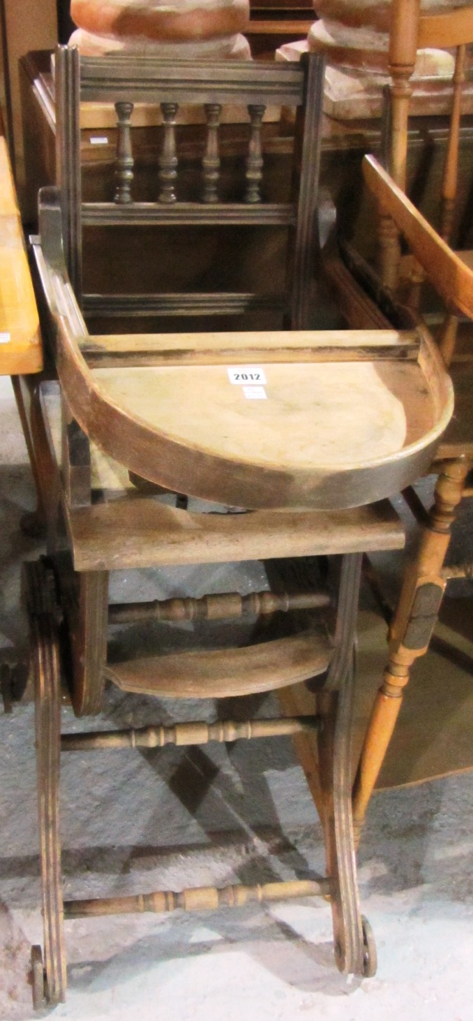 Appraisal: A th century walnut child's high chair