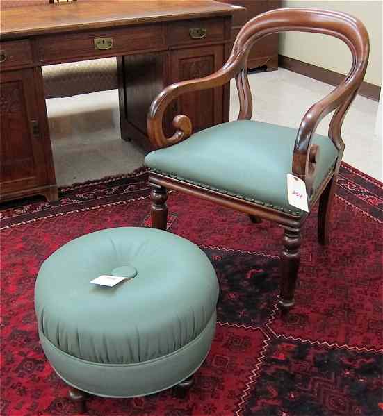 Appraisal: VICTORIAN BALLOON-BACK ARMCHAIR WITH OTTOMAN English late th century the