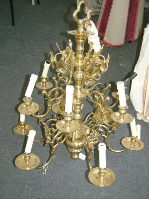 Appraisal: An ornate Dutch style gilt brass twelve branch two tiered