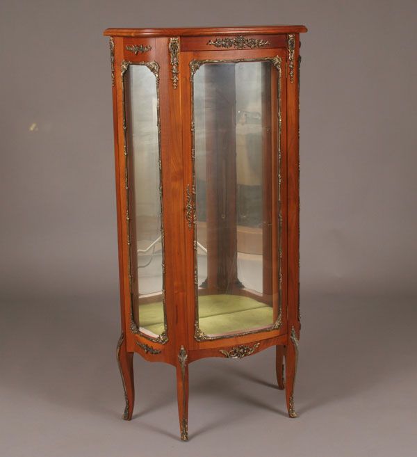 Appraisal: French style display cabinet curved front glass sides and door