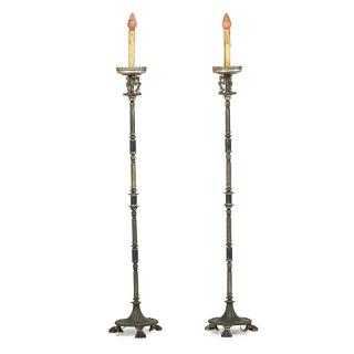 Appraisal: PAIR OF OSCAR BACH PATINATED METAL LAMPS Each supported by