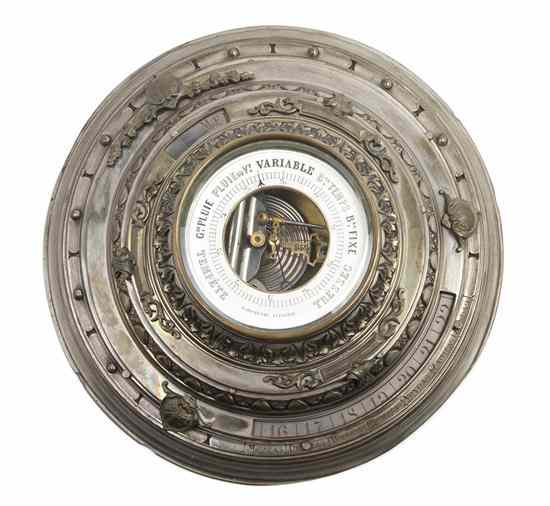 Appraisal: A French Silvered Bronze Aneroid Barometer Calendar of stepped circular