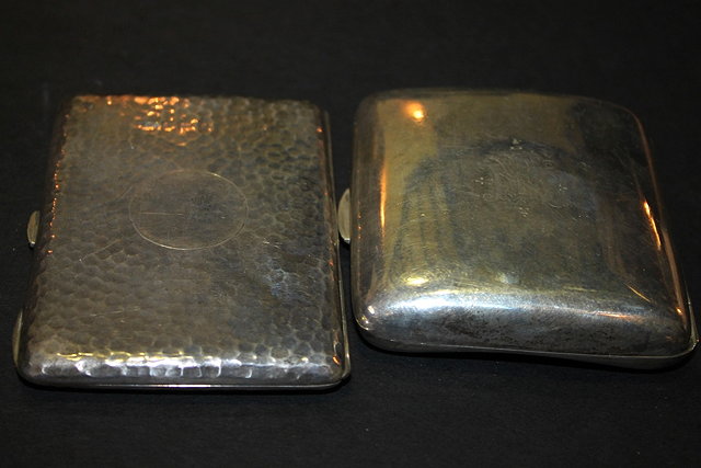 Appraisal: A SILVER GENTLEMEN'S CASE of rectangular form with hammered decoration