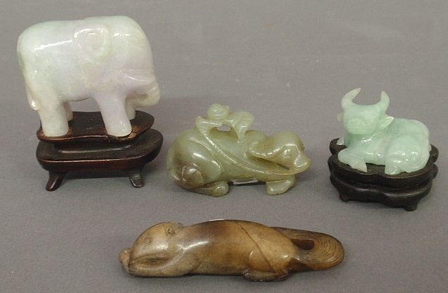 Appraisal: - Four small carved jade figures- elephant on stand h