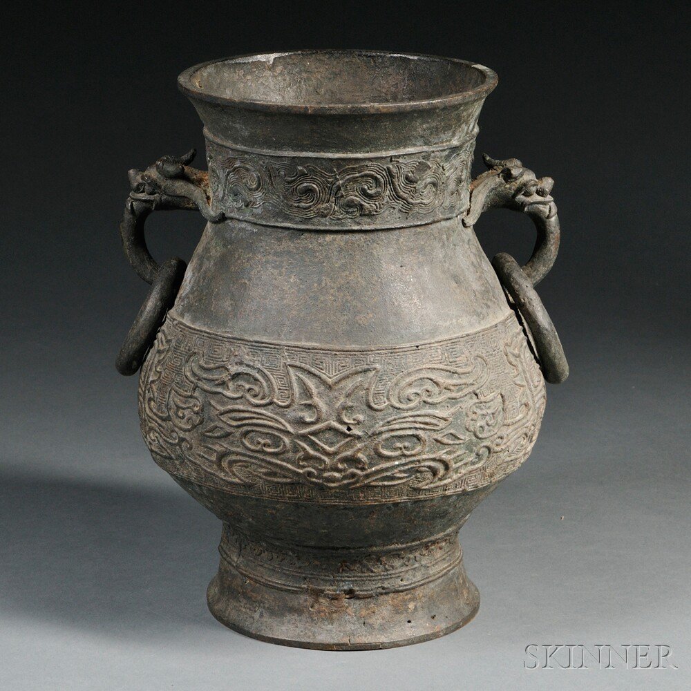 Appraisal: Archaic-style Bronze Wine Jar China bulbous body resting on a