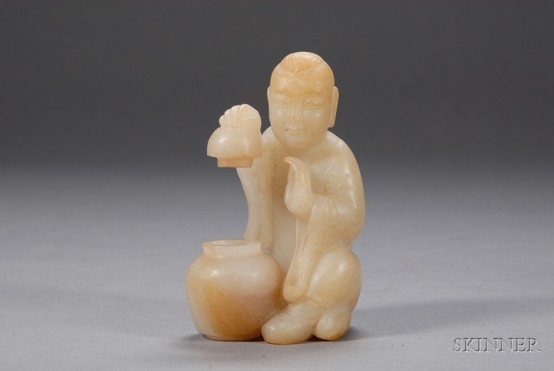 Appraisal: Jade Carving China figure of a small boy opening a