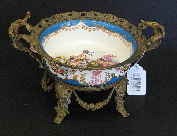 Appraisal: A S vres style porcelain gilt bronze mounted two handled