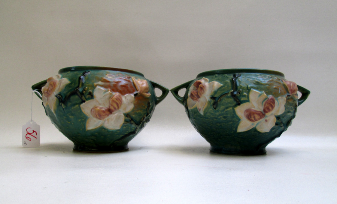 Appraisal: PAIR ROSEVILLE ART POTTERY JARDINIERES in the Magnolia pattern of