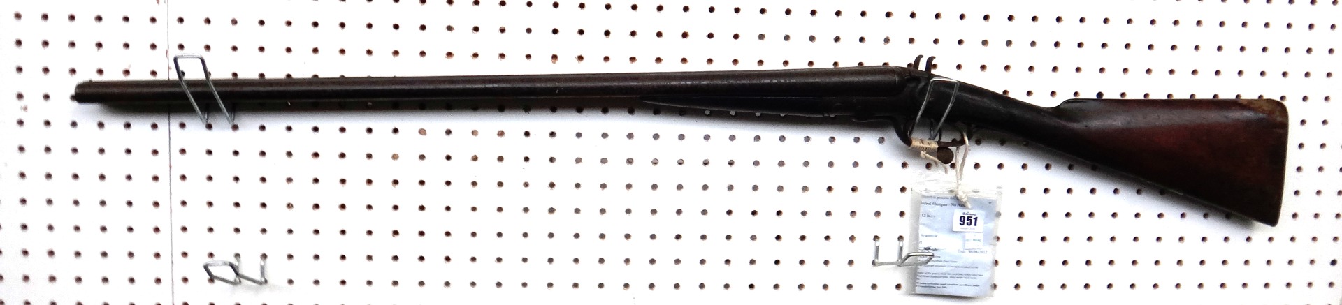 Appraisal: A bore English double barrel shotgun with steel barrels foliate