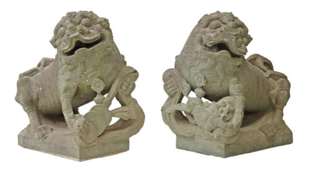 Appraisal: pair Chinese stone guardian foo lions dogs each with floral