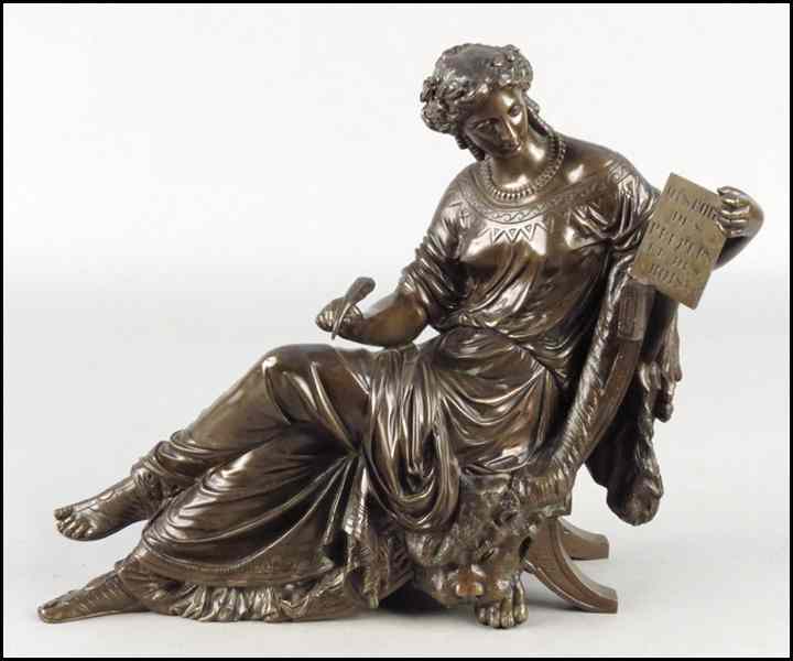 Appraisal: PATINATED BRONZE RECUMBENT WOMAN Depicted in Neoclassical dress holding a