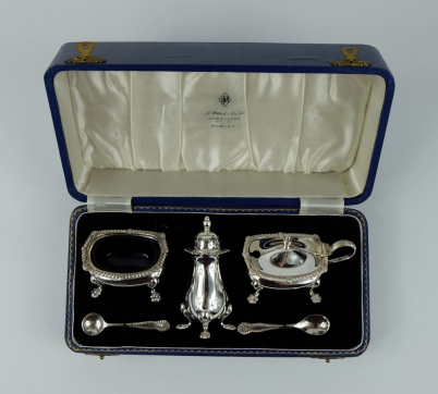 Appraisal: Silver condiment set hall marked Birmingham comprising salt spoon pepper