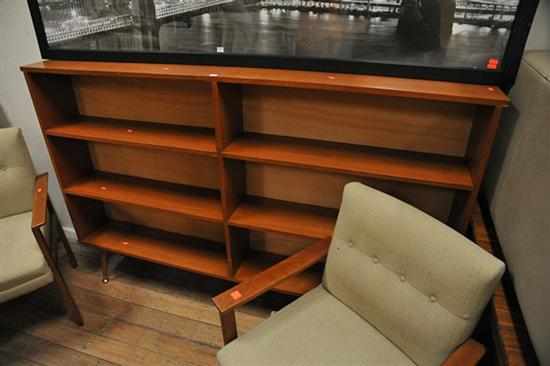 Appraisal: A LARGE TEAK BOOKSHELF ON LEGS