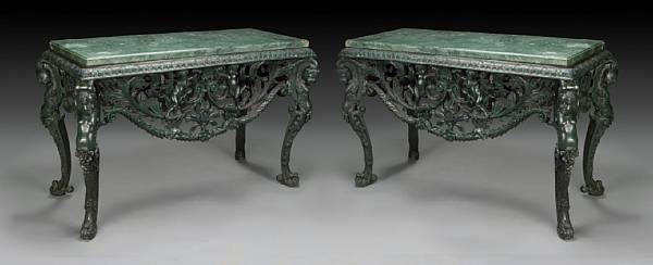 Appraisal: A pair of Rococo style painted bronze iron and marble