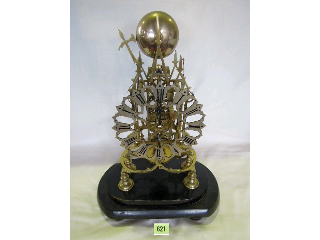 Appraisal: An Edwardian brass skeleton clock with cut steel dial and