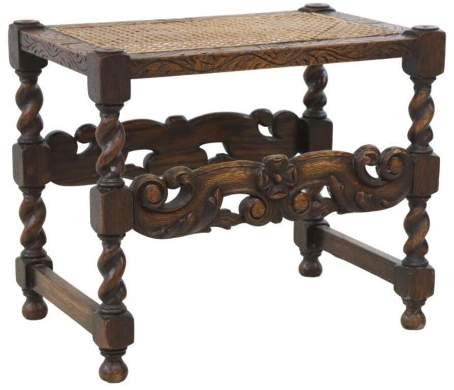 Appraisal: Jacobean style carved oak bench th c inset cane seat