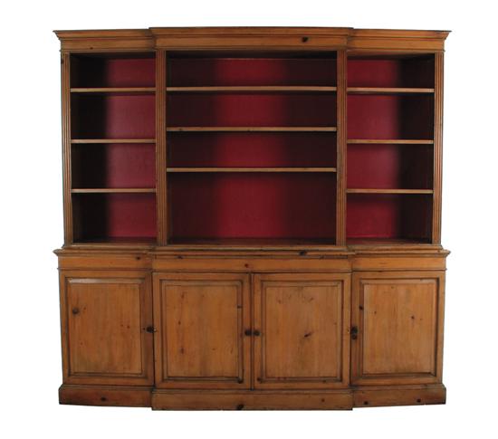 Appraisal: English pine breakfront bookcase circa H W D Provenance Columbia