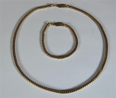 Appraisal: A modern ct gold necklace and matching bracelet each of